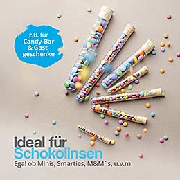 Reagenzglas aus Glas mit Schokolinsen und Korkverschluss als dekorative Verpackung für Give-aways und Gastgeschenke